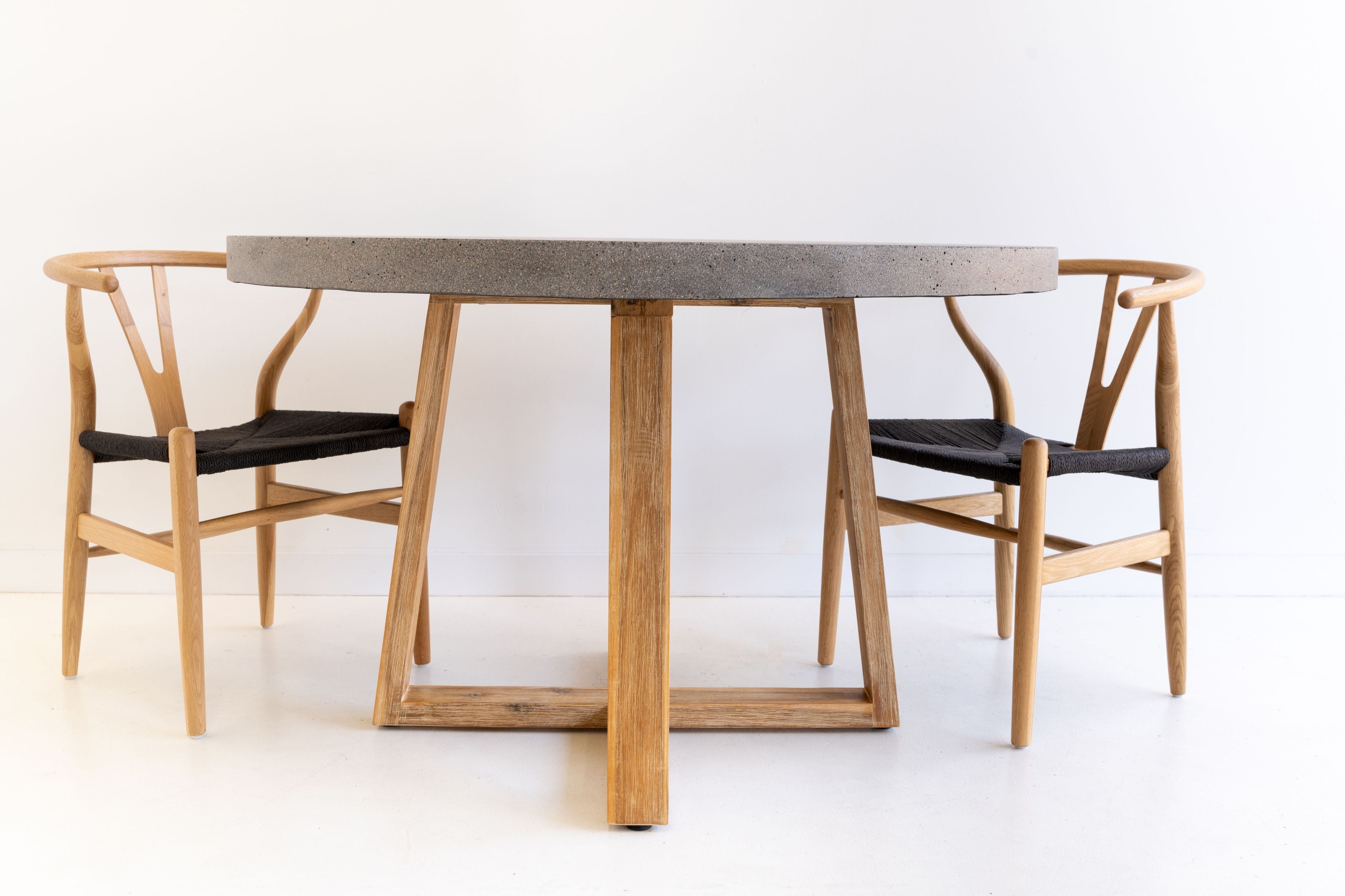 1.2m Alta Round Dining Table - Speckled Grey with Light Honey Acacia Wood Legs - www.elkstone.com.au