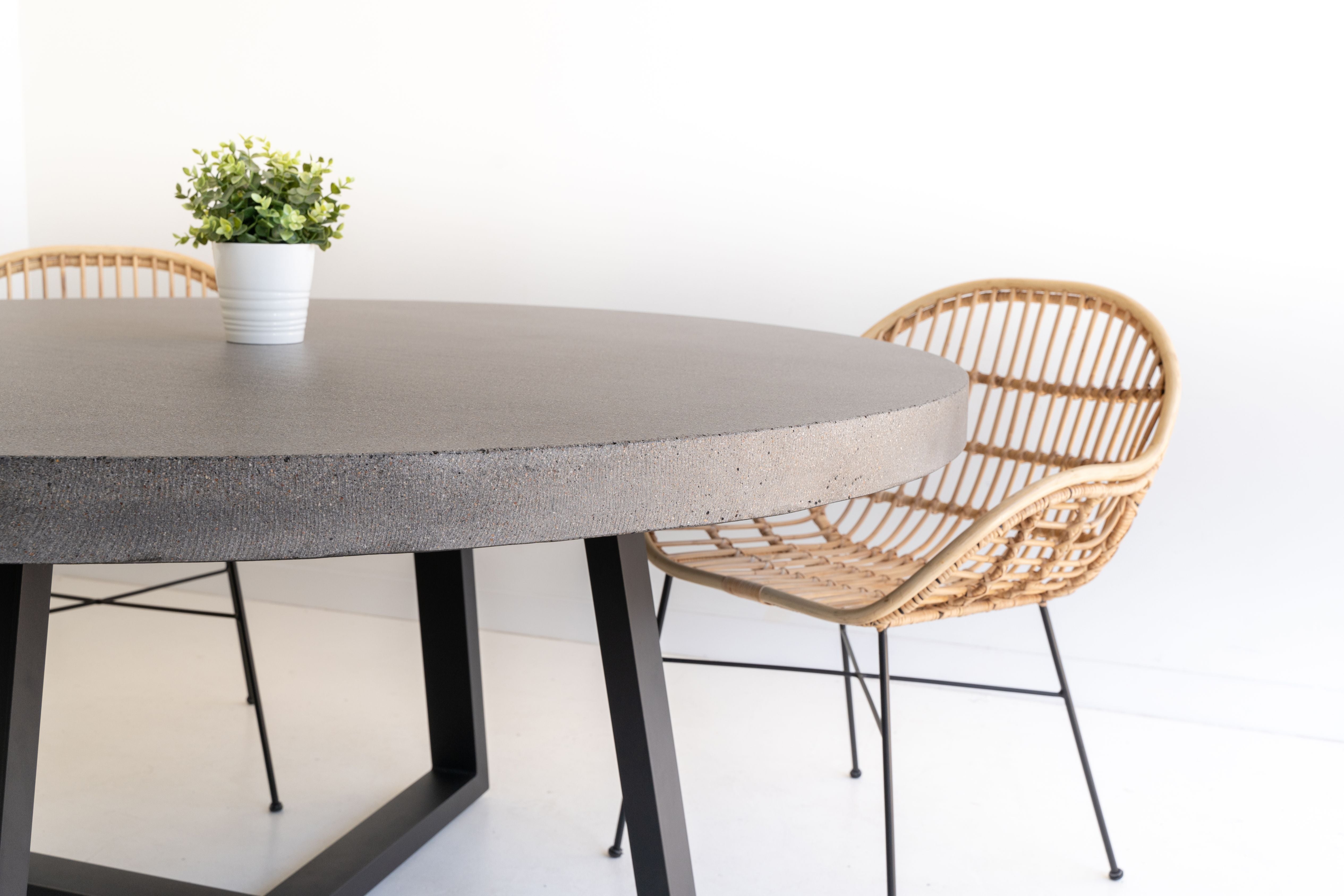 1.6m Alta Round Dining Table - Speckled Grey with Black Powder Coated Iron Legs - www.elkstone.com.au